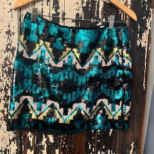 Divided women’s Beautiful Sequined Mini Skirt. Size 8.